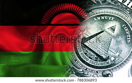 Flag of Malawi on a fabric with an American dollar close-up.