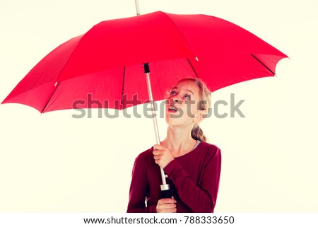  blond girl with red umbrella in frontof white background
