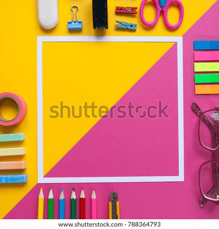 Back to school, square frame with stationery on pink and yellow background. Trendy flat lay.