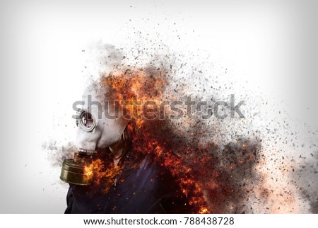 Person with gas mask and destructive fire, pollution and climate change Royalty-Free Stock Photo #788438728