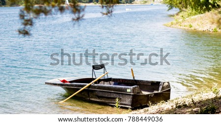 Rowboat in beautiful water