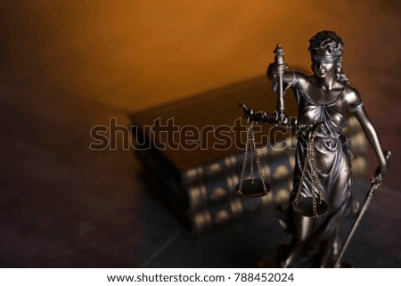 Law code. Statue of justice, books. Place for typography.