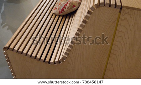 curved line detail of wooden plank bench