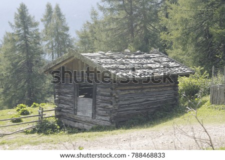 
typical mountain huts on the Alps in Italy