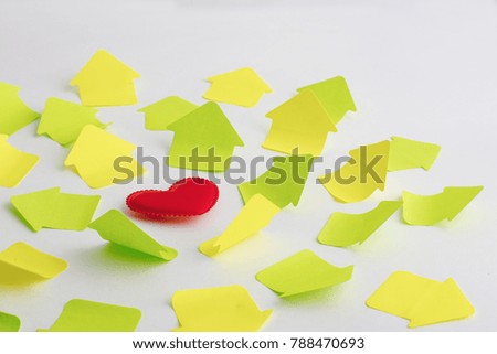 Red heart and green and yellow sticker arrows round shape pattern isolated on white. Valentine's Day lovers concept. Love spreading close up