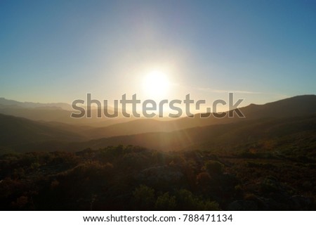Sunset at the northern coast of corsica  Royalty-Free Stock Photo #788471134