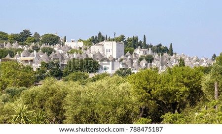 Panoramic view of the roofs of famous Alberobello's trulli, Apulia, Italy