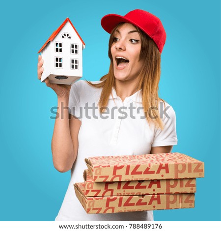 Pizza delivery woman holding a little house on colorful background