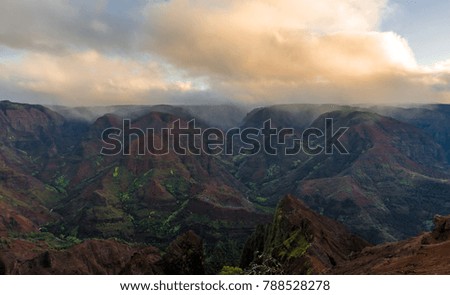 Waimea Canyon at sunrise as rain falls in the distance 2 - Kauai, Hawaii