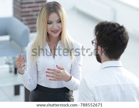 closeup of business woman talking with a colleague