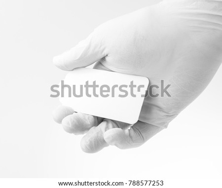 Man holding white blank card