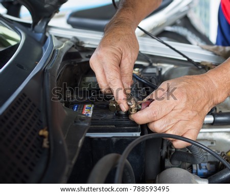 The old man' s hand is holding wrench doing screw fix hex thin nut Royalty-Free Stock Photo #788593495