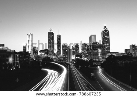 Black and white long exposure of Atlanta skyline at night