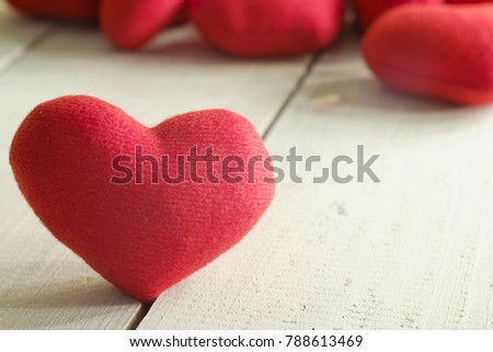 Red fabric heart on wooden background ,Valentines day background or Wedding day party
