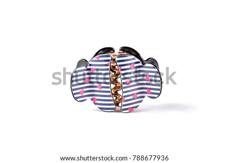 Fashion design two hair clips. Pair of hair claws over white background. Woman hair accessories.