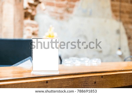 mock up menu object in cafe and restaurant,blank booklet with white sheets of paper on wooden table on cafeteria,promotion and information for business mock up.