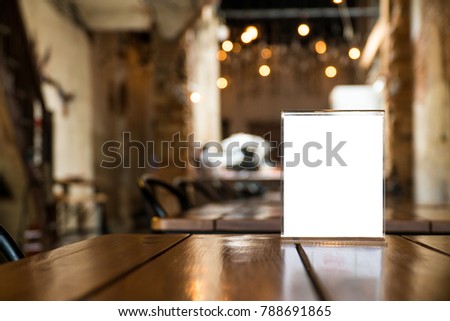 mock up menu object in cafe and restaurant,blank booklet with white sheets of paper on wooden table on cafeteria,promotion and information for business mock up.