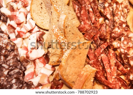 photo of cold cuts at a picnic outside