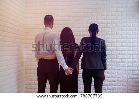 Love triangle cheating man in the office,marital infidelity concept Royalty-Free Stock Photo #788707735