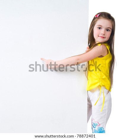 cute child behind a white board