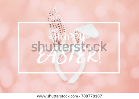 Flat lay aerial image of accessories costume Happy Easter holiday background concept.Text symbol with bunny ear.Top view objects & Bokeh on modern rustic beautiful pink paper at home office desk.