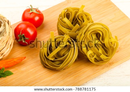 Raw fettucine pasta ready for bowling