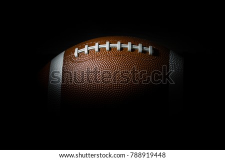 American football on dark background. Super bowl Royalty-Free Stock Photo #788919448