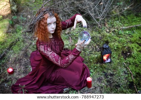 Witch holds a ritual in the depths of the forest