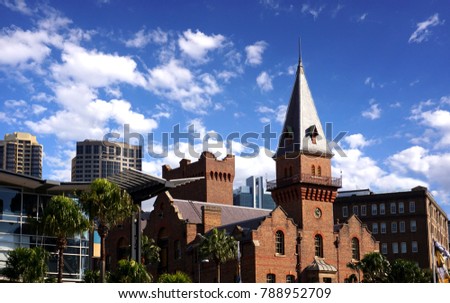 City background of Sydney city, Australia with blue sky and clouds. Image of building in panorama view in summer.
