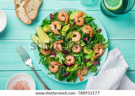 fresh healthy avocado and shrimps salad. Top view Royalty-Free Stock Photo #788953177