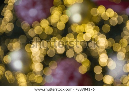 Colorful bokeh of the light from christmas tree in the city.