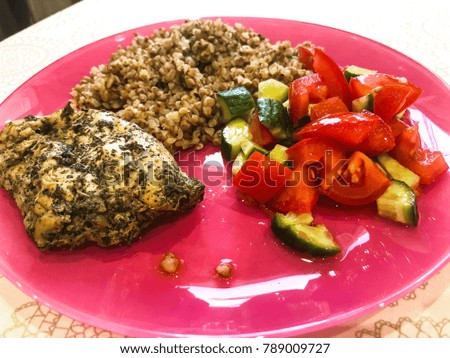 Buckwheat porridge, chicken,  vegetable. Studio Photo