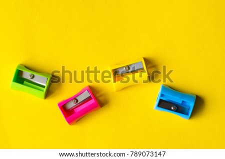 pencil sharpener,colored background