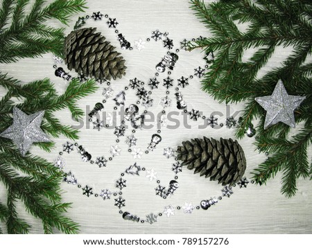 christmas decoration with garland lights on fir branches background
