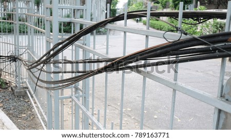 electric wire on steel doors background
