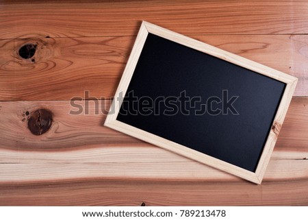 frame backboard on wood table.