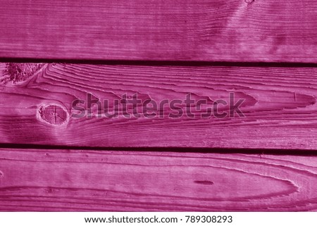 Wooden wall texture in pink tone. Abstract background and texture for design.