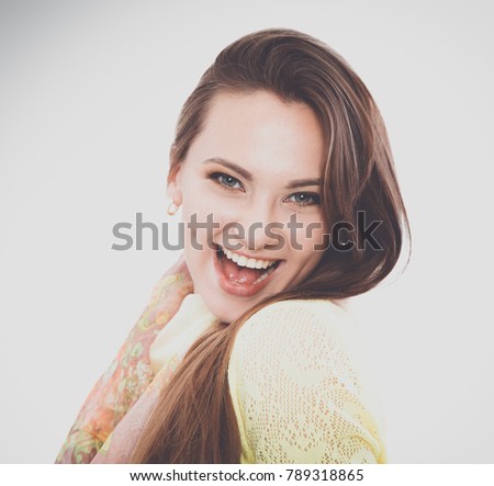 Beautiful woman portrait smiling isolated over white background