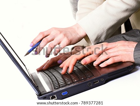 hands on laptop in office stock photo