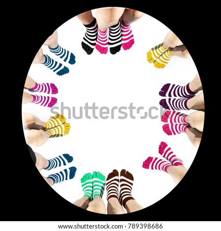 Legs in fashion and modern socks. Isolated on white background. Friendship or working team abstract photo.