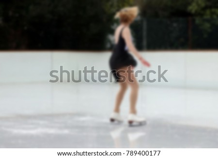 Ice skating theme creative abstract blur background with bokeh effect.