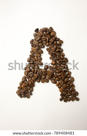 A the letter. alphabet of coffee. coffee beans. concept of healthy eating. photo for your design. vertical orientation of the sheet