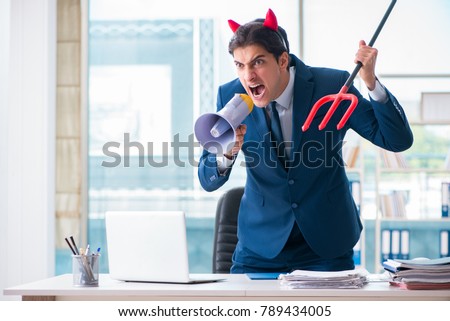 Devil angry businessman in the office Royalty-Free Stock Photo #789434005