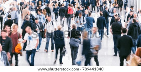 crowd of business people at a trade show