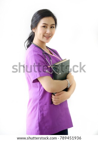 Portrait of beautiful female doctor smiling on white background.