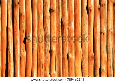 Wooden boards in the fence.