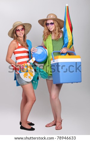 two beautiful  girls ready for the beach