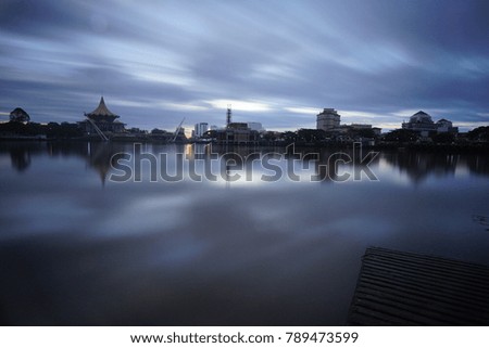 long exposure cloud formation with city view.photo slightly noisy and sillhouette concept.kuching malaysia