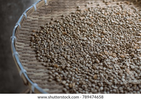 roasted coffee beans on woven background