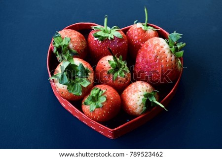 Strawberry on black background.